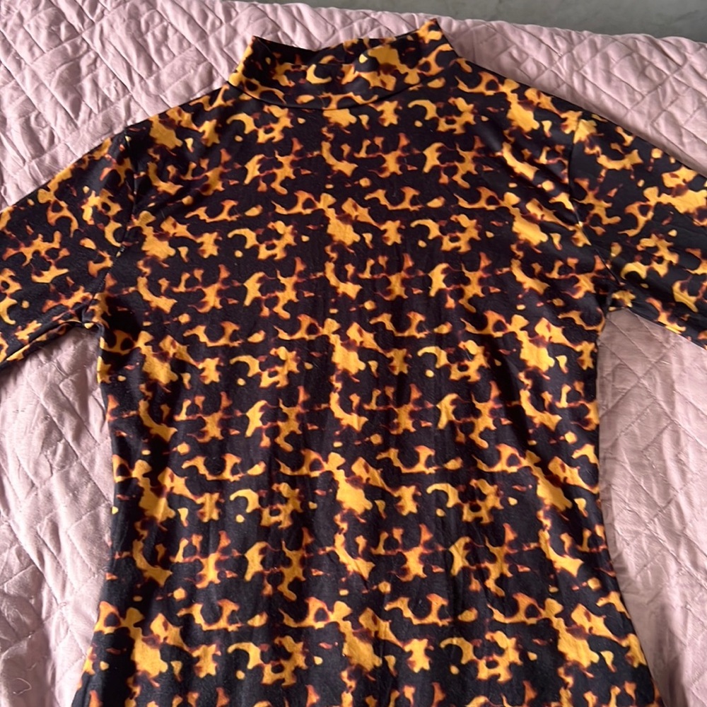 Turtle neck looks like fire. Loved the shirt especially for Instagram pics.
